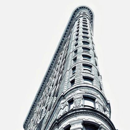 Modern Architectural Marvel Of The Flatiron Building Captured From A Low Angle In New York City.