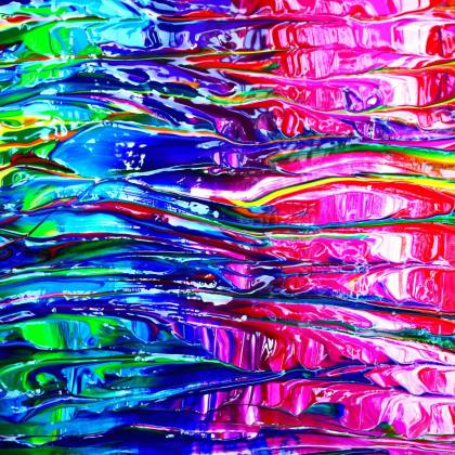 Colorful And Abstract Paint Texture With Vibrant Rainbow Hues.