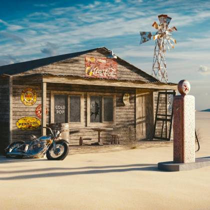 A Vintage Gas Station In A Desert Setting, Featuring A Classic Motorcycle And Rustic Signs.