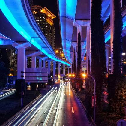 Long Exposure Of Shanghai's Illuminated Elevated Highway With Dynamic Light Trails At Night.