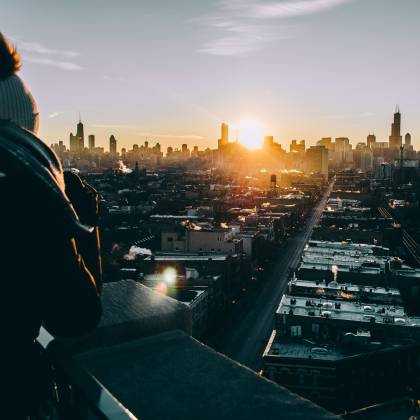 Photographer Captures The Chicago Skyline At Sunrise, Highlighting Urban Architecture And Dramatic Lighting.