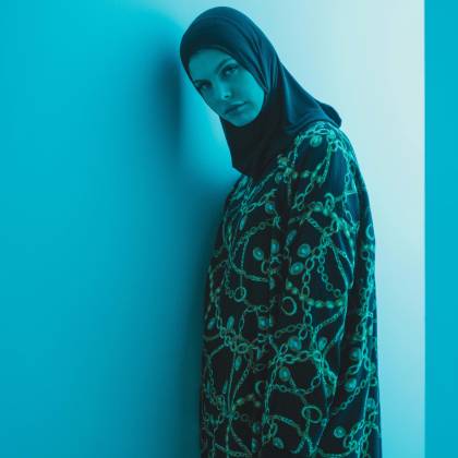 Elegant Portrait Of A Woman In Hijab With A Modern, Artistic Style And Blue Tones.