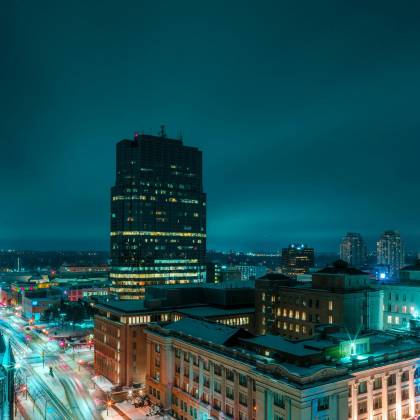 Stunning Long Exposure Shot Of London's Illuminated Skyline In Winter, Highlighting Modern Architecture.